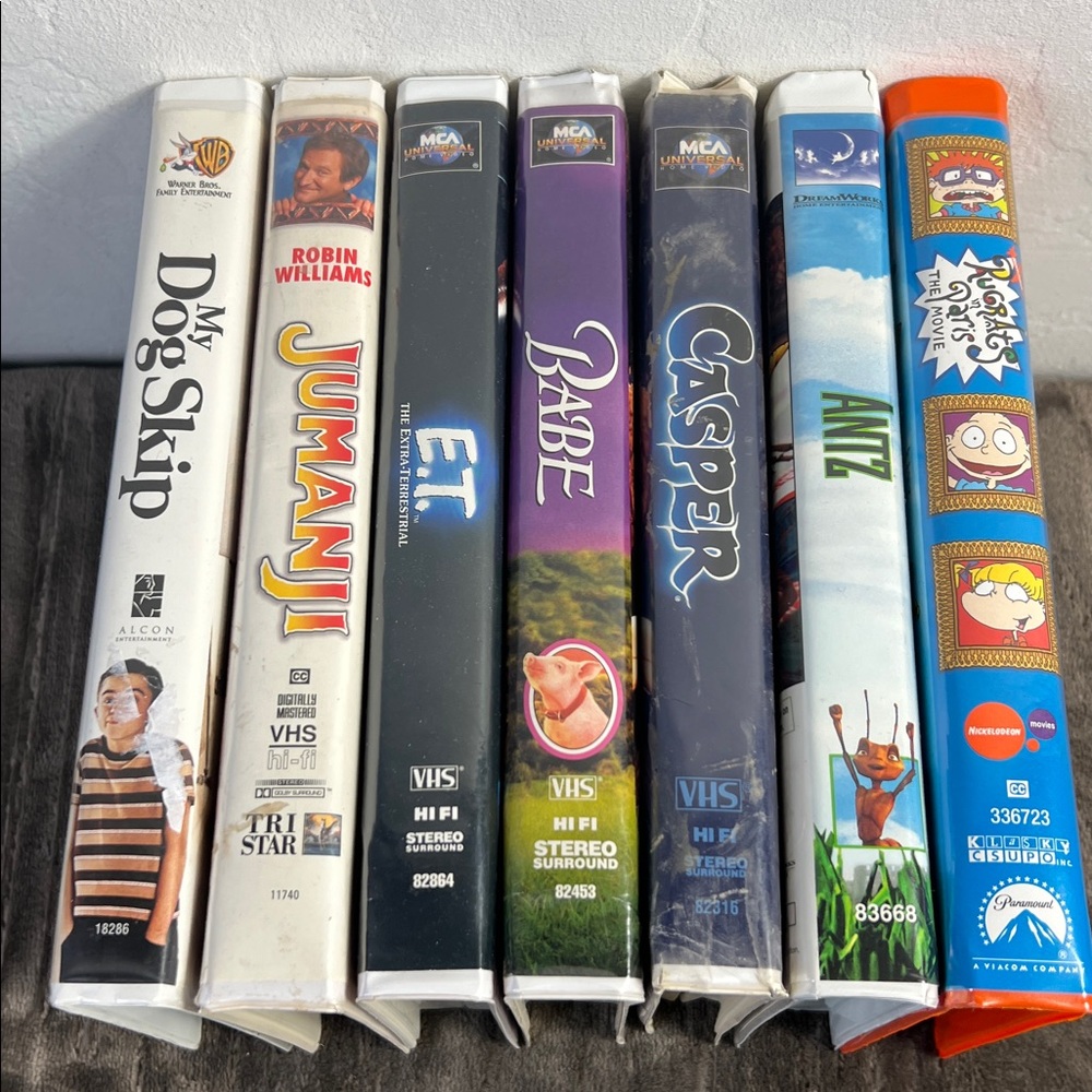 Vintage lot of 7 VHS Movie Collection kids Rugrats, Jumanji, Babe, Casper, E.T.